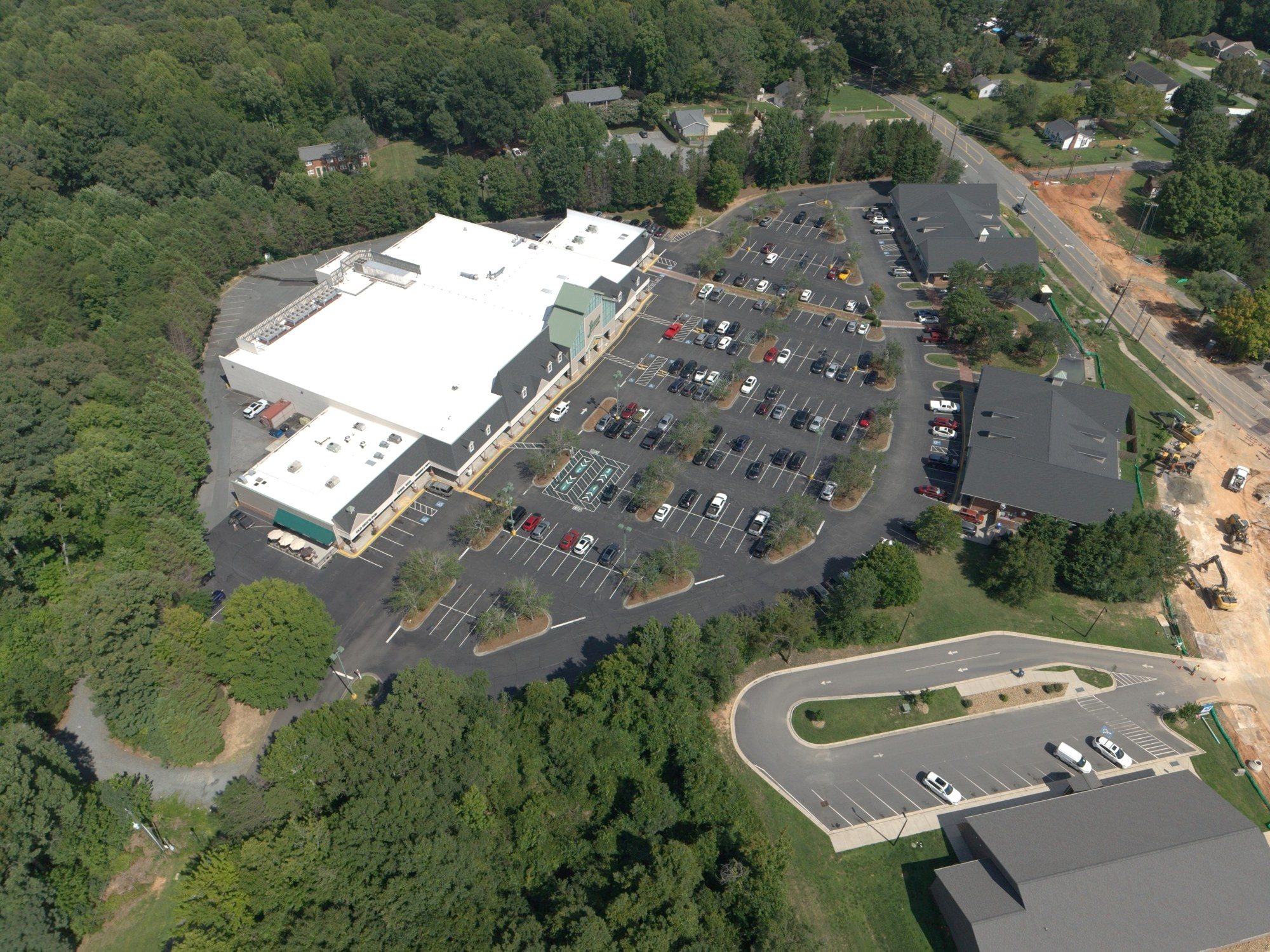 Commercial shopping center documented from an aerial perspective