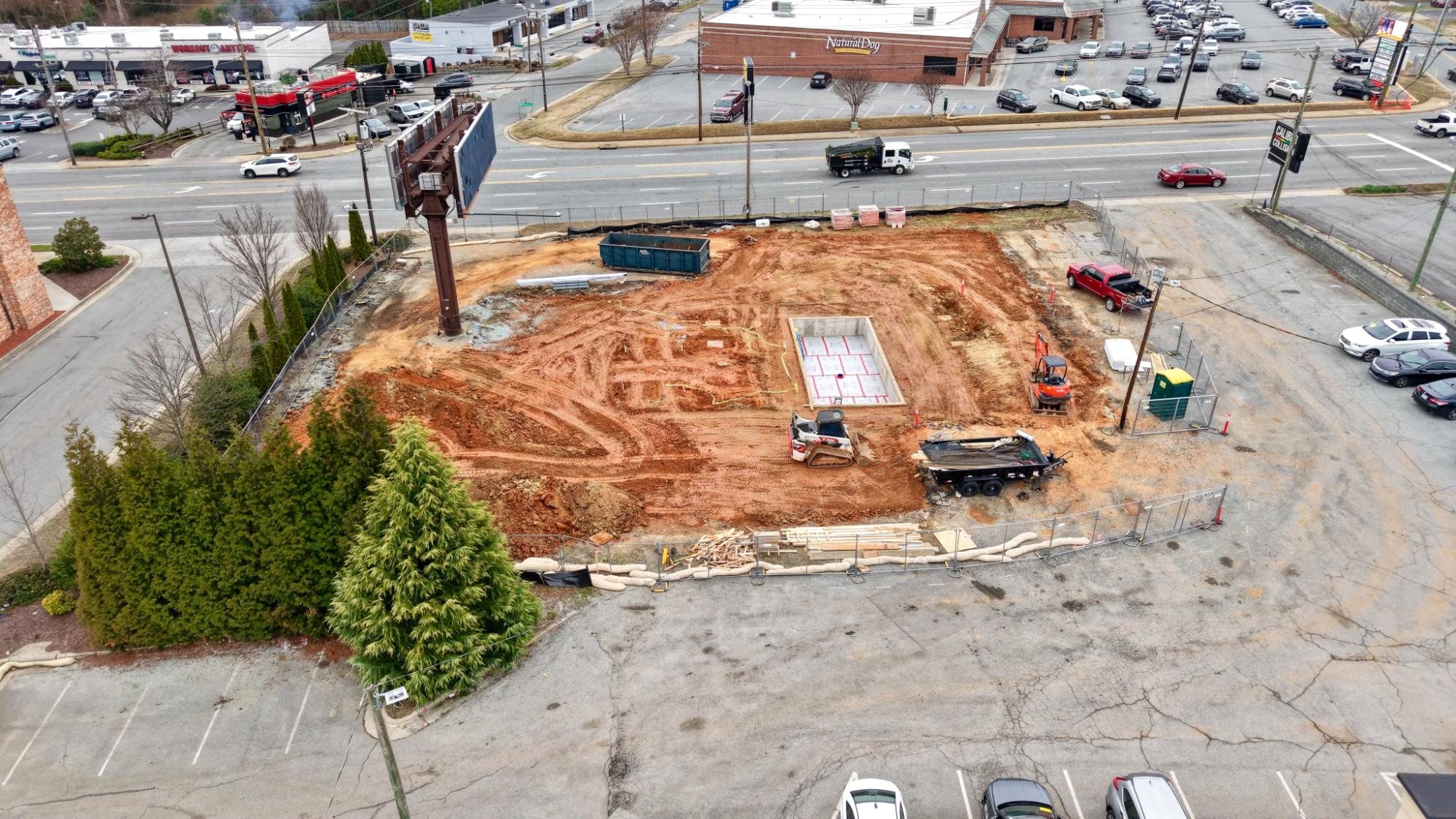 7 Brew Greensboro foundation, rear oblique, April 2026