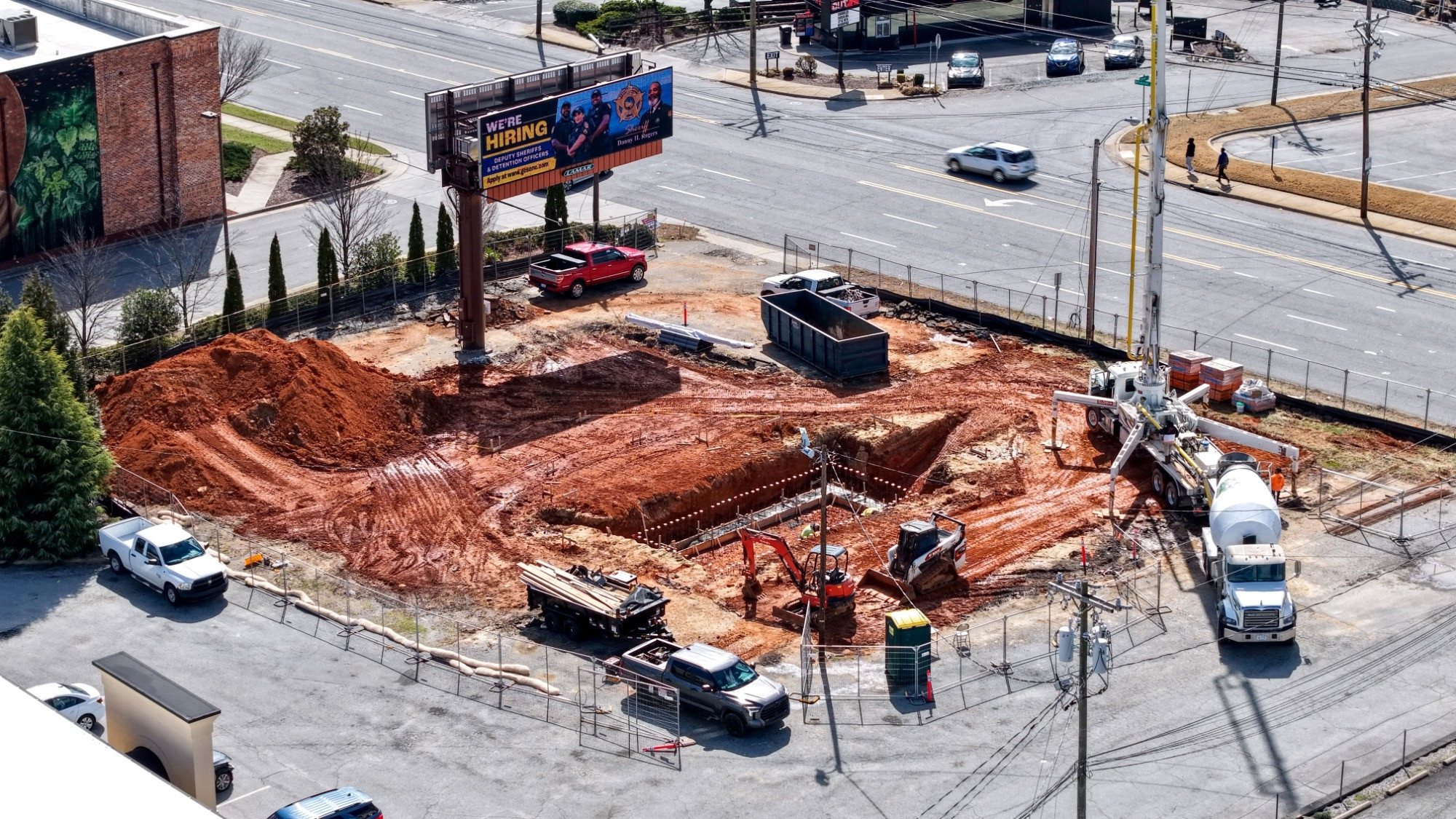 7 Brew Greensboro foundation excavation, late March 2026