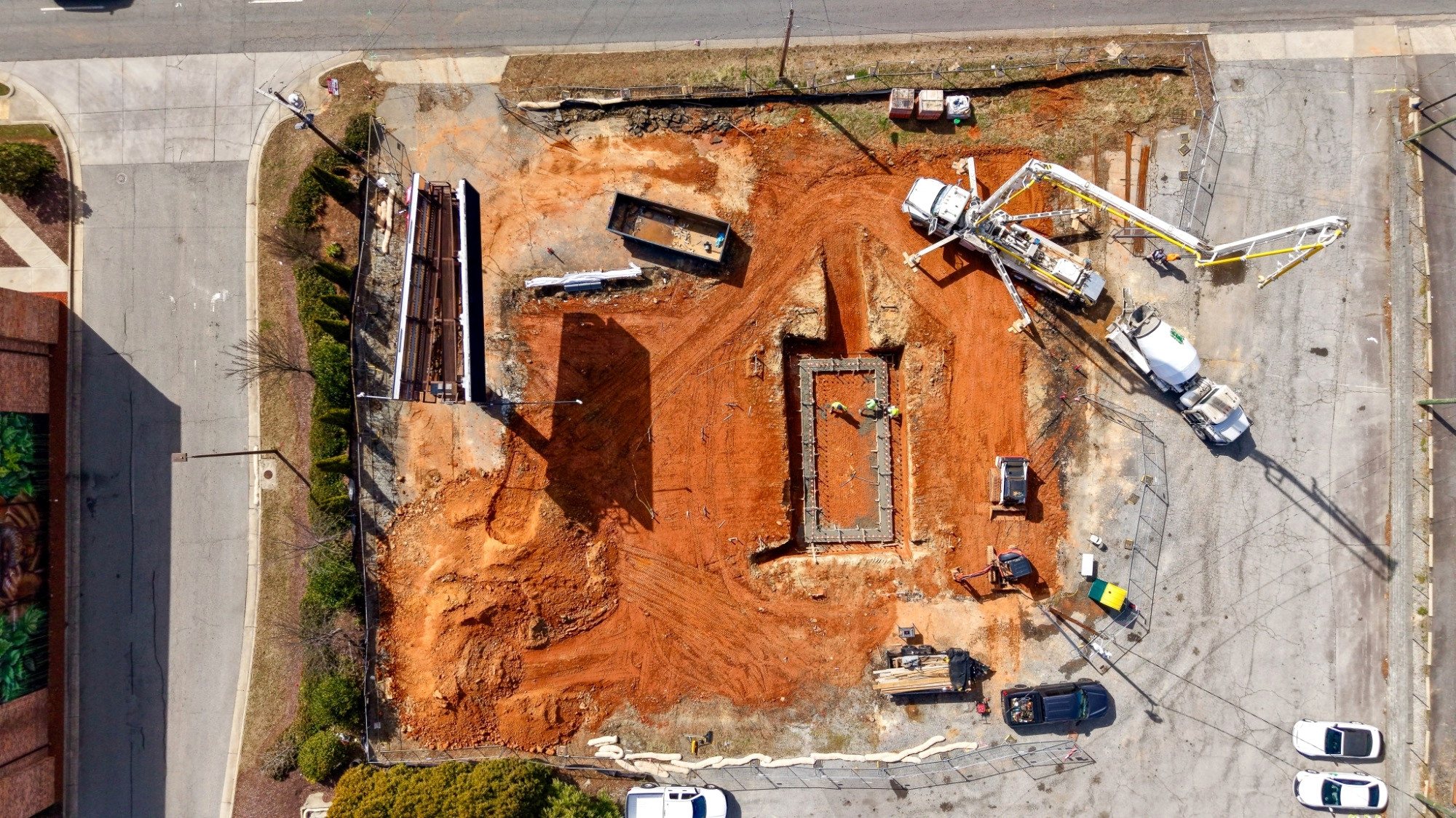 7 Brew Greensboro foundation excavation, late March 2026
